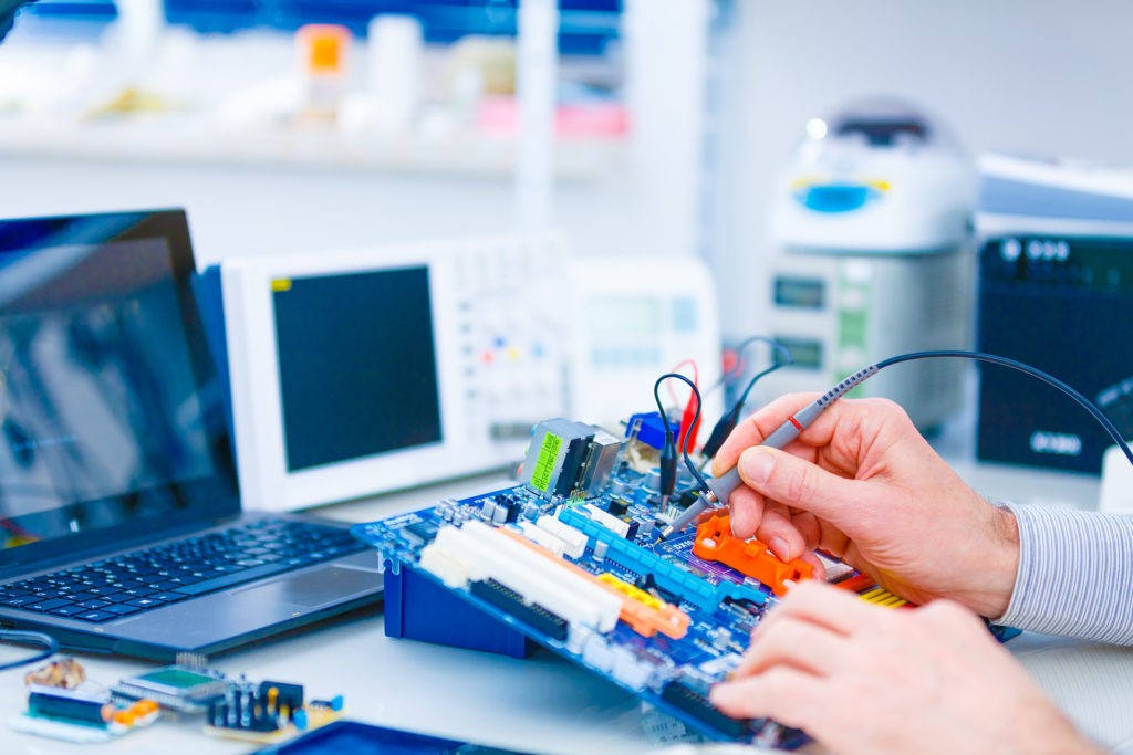 Elecrician choosing electrical goods in the shop